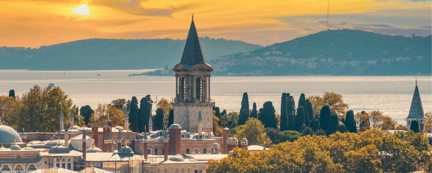 Tokapi Palace with a waterscape and hillsides in the background