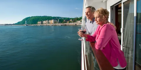 Couple on a Veranda Stateroom balcony