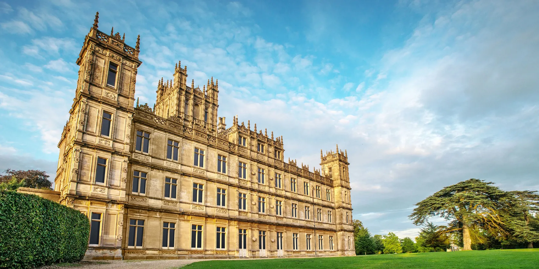 Historic castle with lush green surroundings